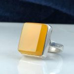 انگشتر عقیق زرد شرف شمس به وقت