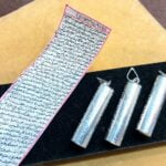 حرز امام جواد (ع) دست نویس روی پوست آهو اصل همراه با قاب نقره